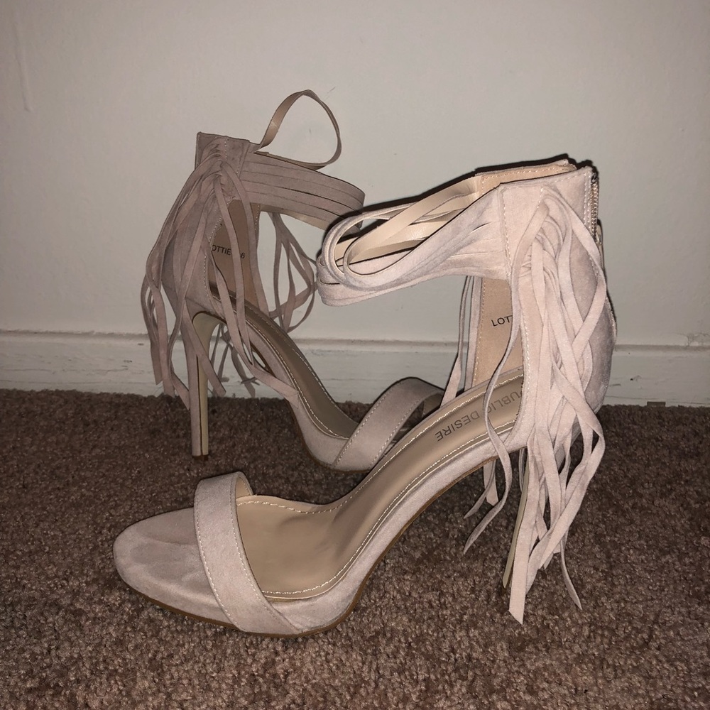 Fun fringe ankle strap heel.